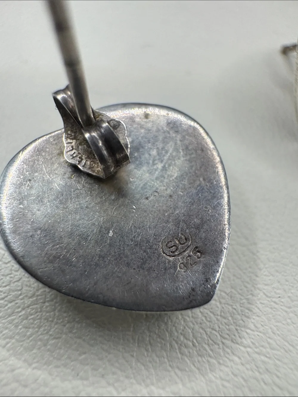 Silver Heart Stud Earrings with Black Accent Detailing